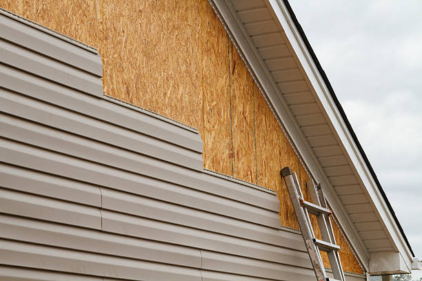 Professional Siding Replacement technician working in Atlantic, PA